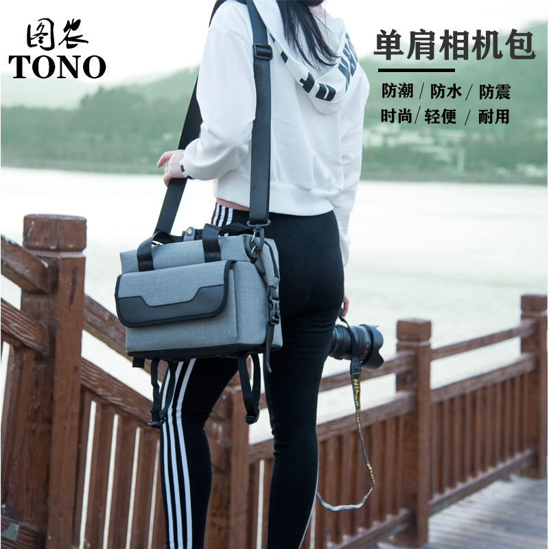 新款單肩相機包防水斜跨單反攝影包大容量男女戶外休閑手提挂包