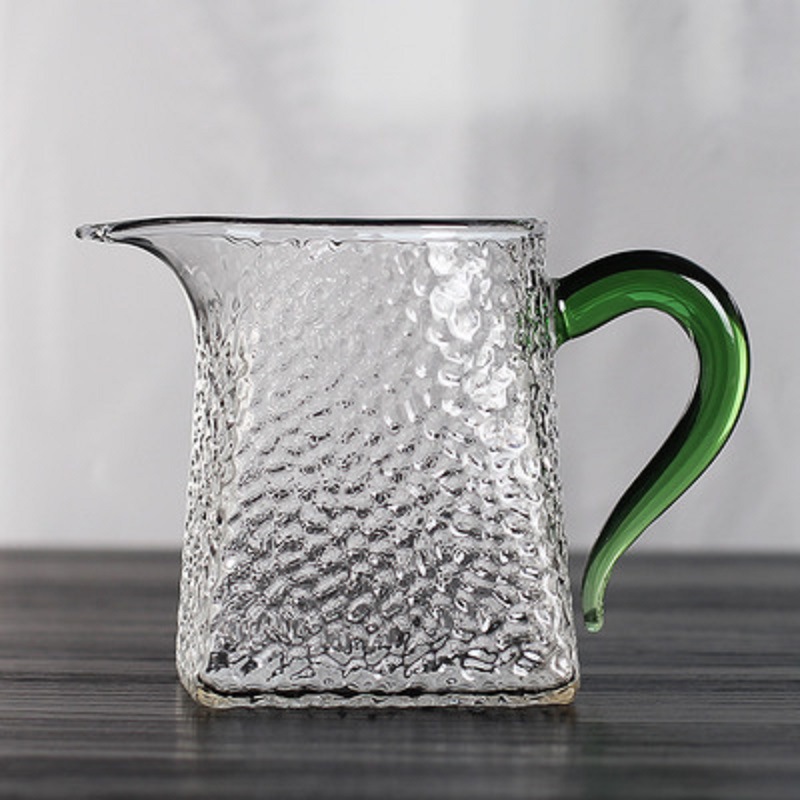 Fábrica engrosada martillo patrón de color mango de vidrio de borosilicato cuadrado justo taza de té Filtro de fuga de té Mar hogar taza pública