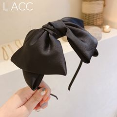 韓国のシンプルなレトロな黒い蝶結びのカチューシャ