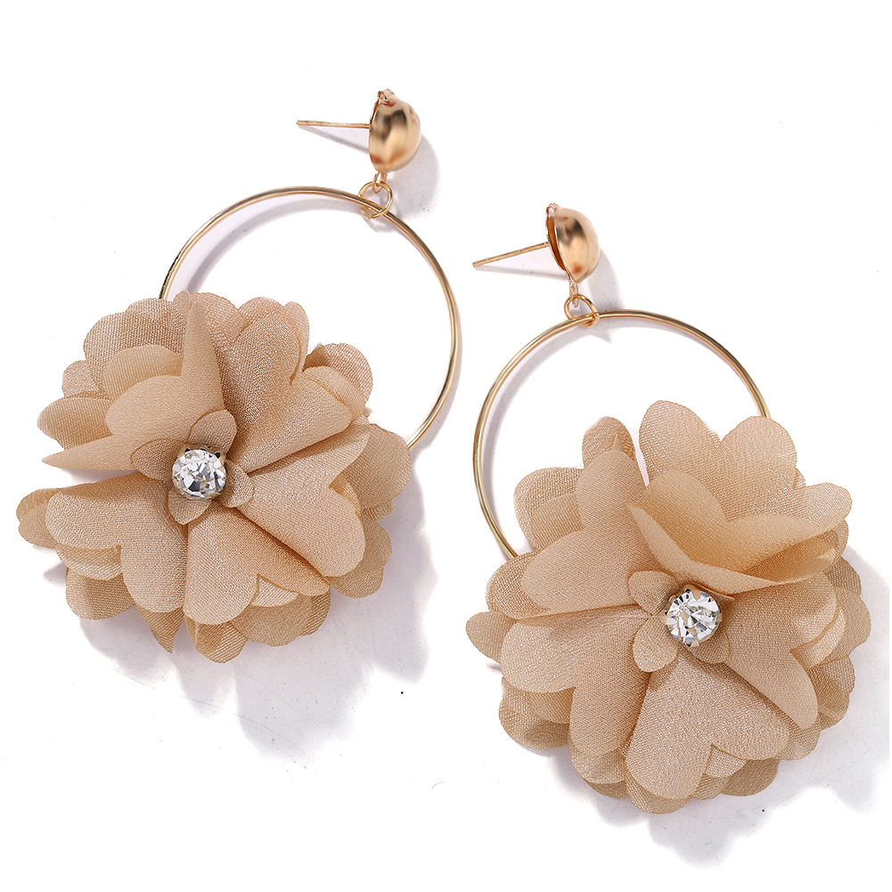 Fashion Wild Flower Diamond Earrings Female New Fresh Sweet Fabric Earrings display picture 7