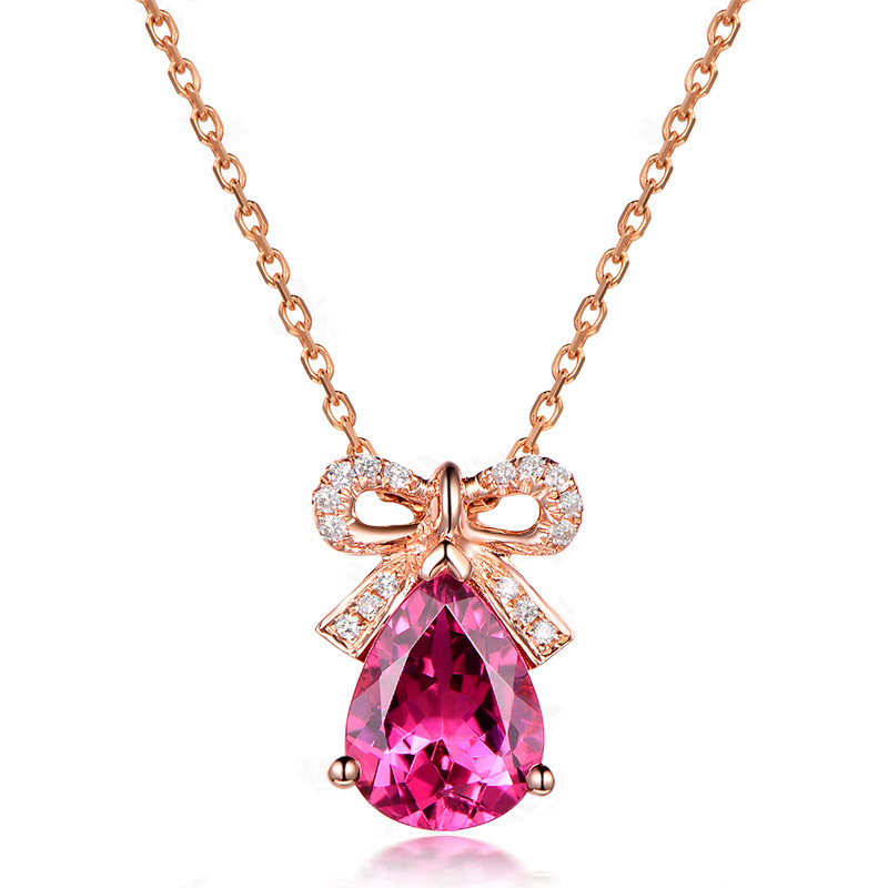 Classic stone inlay with bow with zircon drop-shaped