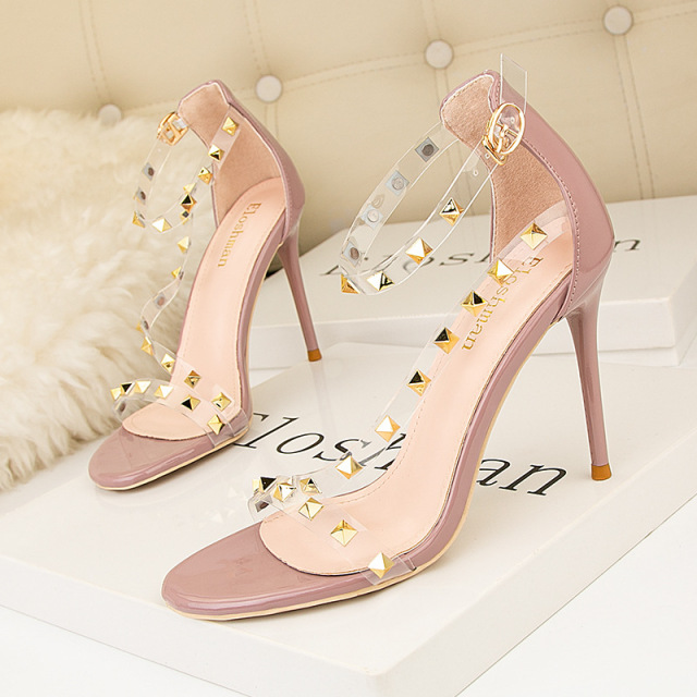 Slim heel ultra-high heel rivet shallow mouth pointed head sexy hollowed out one line strap transparent sandals