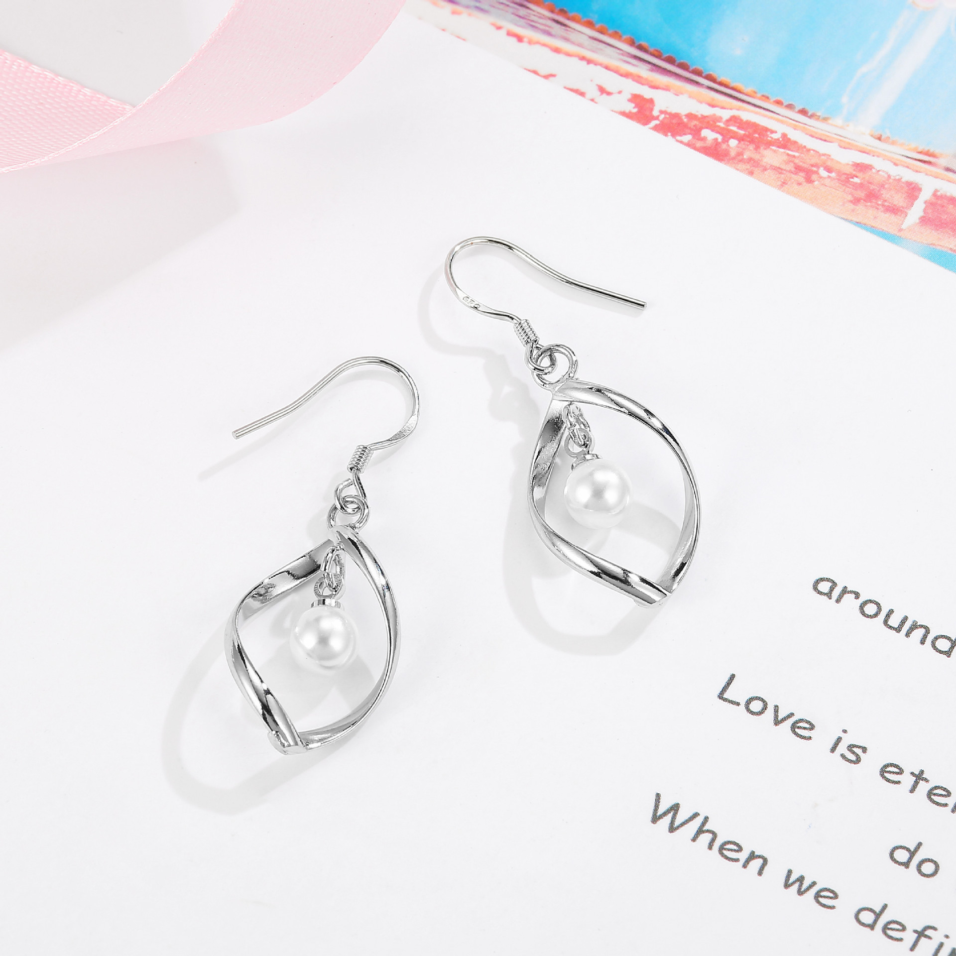 Universal earrings from pearl, wish