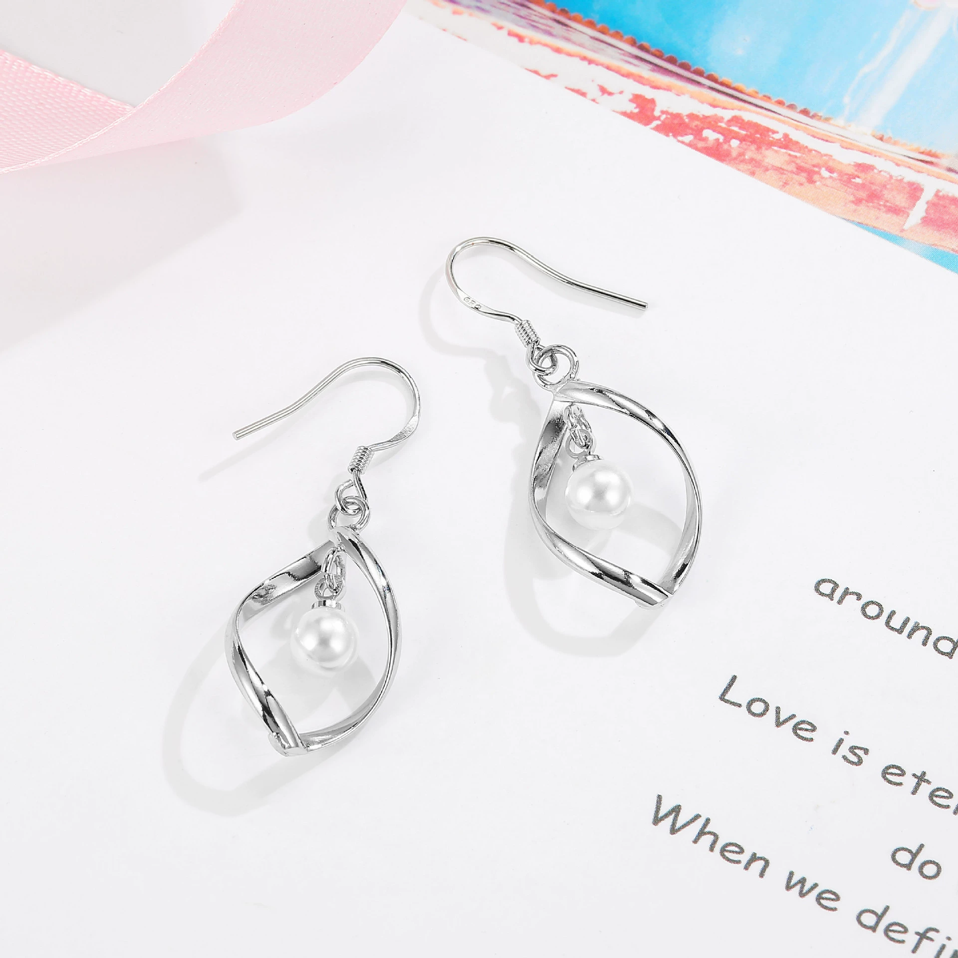 Universal earrings from pearl, wish