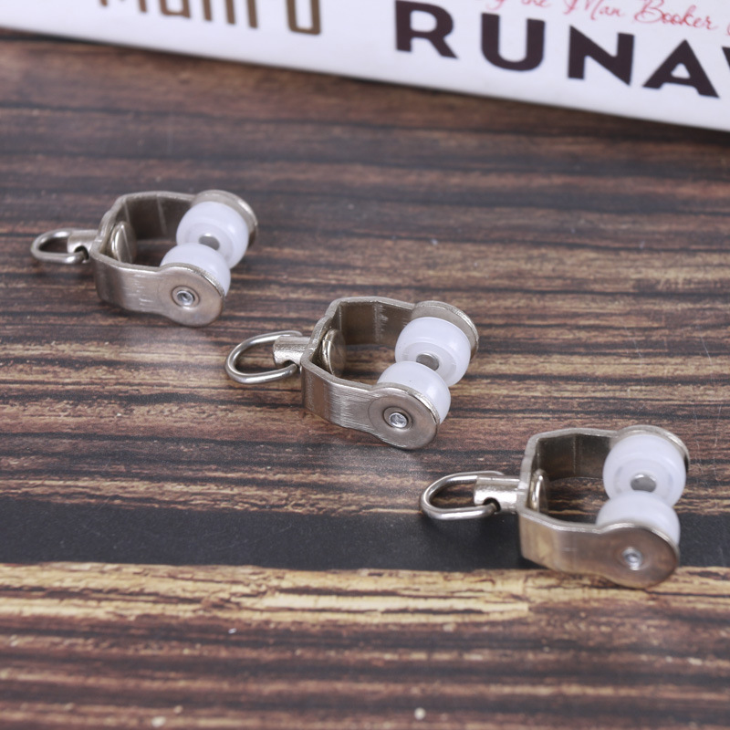 Factory supply curtain track pulley accessories iron Middle curved wheel old curved track wheel bead mute roller