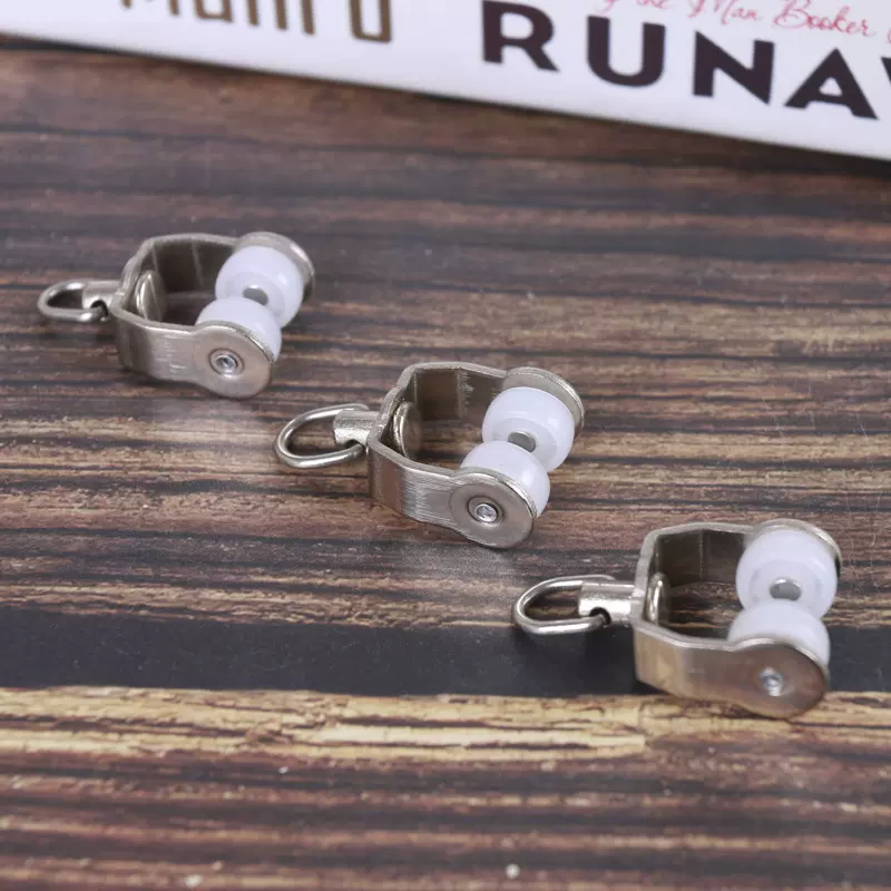 厂家供应 窗帘轨道滑轮配件铁中弯轮 老式弯轨轮子走珠静音滚轮