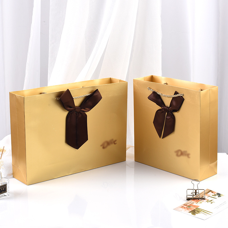 巧克力手提纸袋定制服装购物广告袋 牛皮纸化妆品食品礼品包装袋