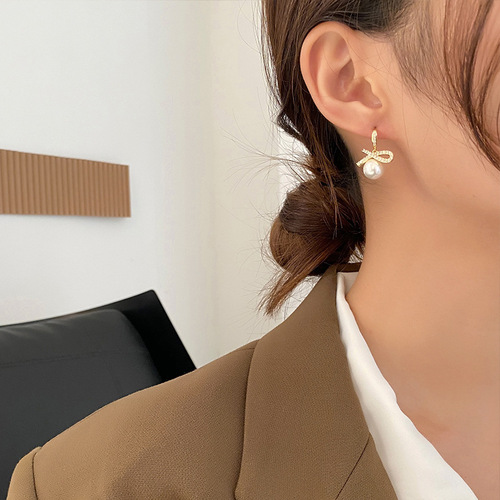 Korean new ear hook short symmetrical bow pearl earrings personality simple temperament small internet celebrity earrings for women