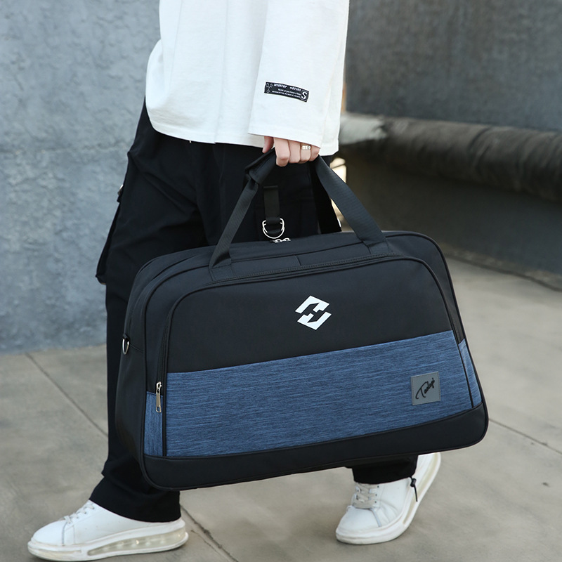 Moda simple gran capacidad bolsa de fitness 2020 nuevo estilo coreano de moda impermeable resistente al desgaste de nylon bolsa de deportes fábrica al por mayor