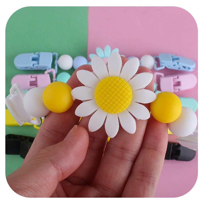 Bebé suministros girasol chupete cadena pañuelo clip bebé calmante silicona Juguete plástico clip de doble cabeza
