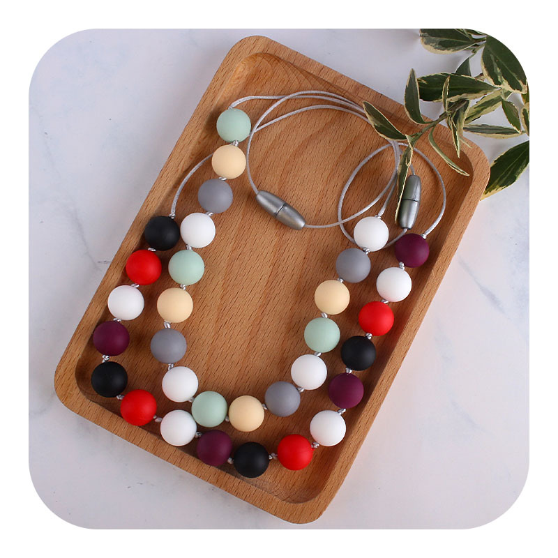 Comercio exterior Amazon collar nuevo bebé molar silicona mordedor collar masticable colgante mordedura gel mordedor palo