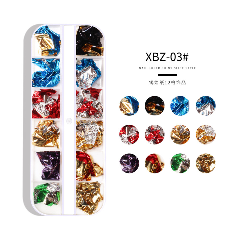 Joyería de hoja de color de uñas de Venta caliente transfronteriza 12 caja de tira de rejilla uñas papel de estaño roto hoja de oro de doble cara hoja de plata joyería