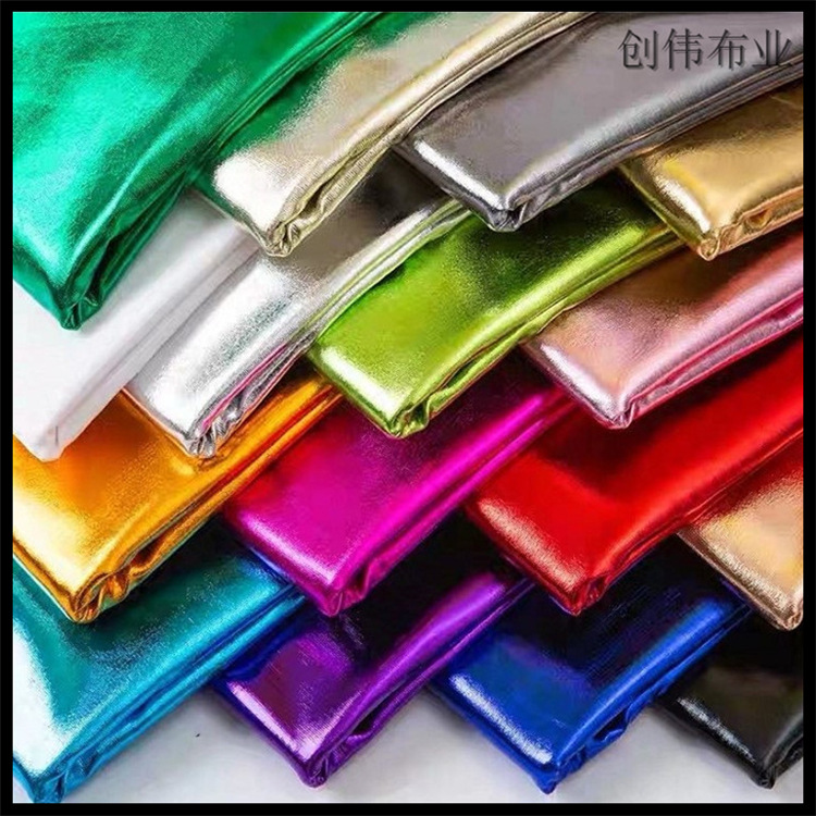 冰丝滑面针织弹力烫金工艺闪光亮光布料  舞台表演装饰服装面料