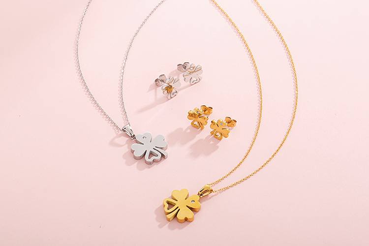 new stainless steel hollow four-leaf clover clavicle necklace earrings two-piece set wholesale