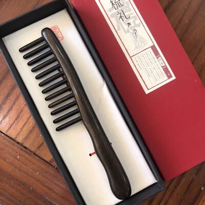 厂家直销高档精品按摩梳檀木插齿梳12齿沉贵宝加厚手柄
