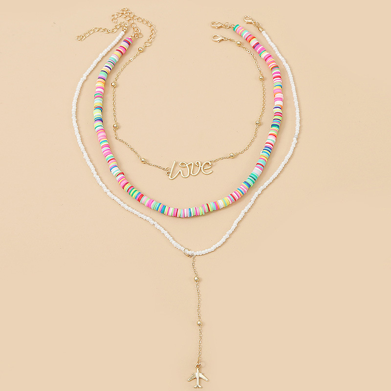 Longues Lettres D'amour Trois Multicouches En Céramique Souple Collier Tendance Perle Pendentif Bijoux En Gros Nihaojewelry display picture 5