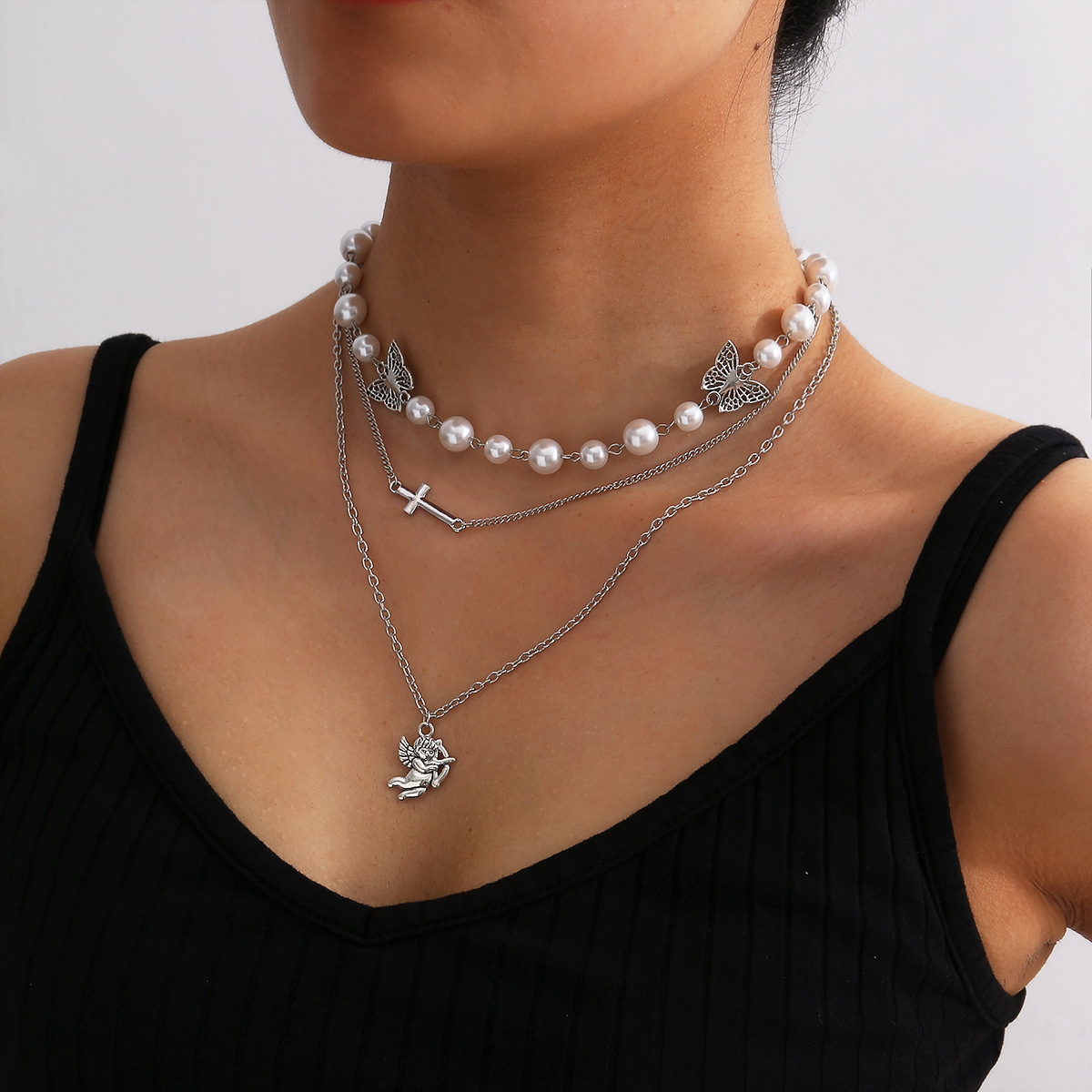 Fashion  Butterfly Pendant Clavicle Necklace Personalized Simple Pearl Cross Necklace display picture 1