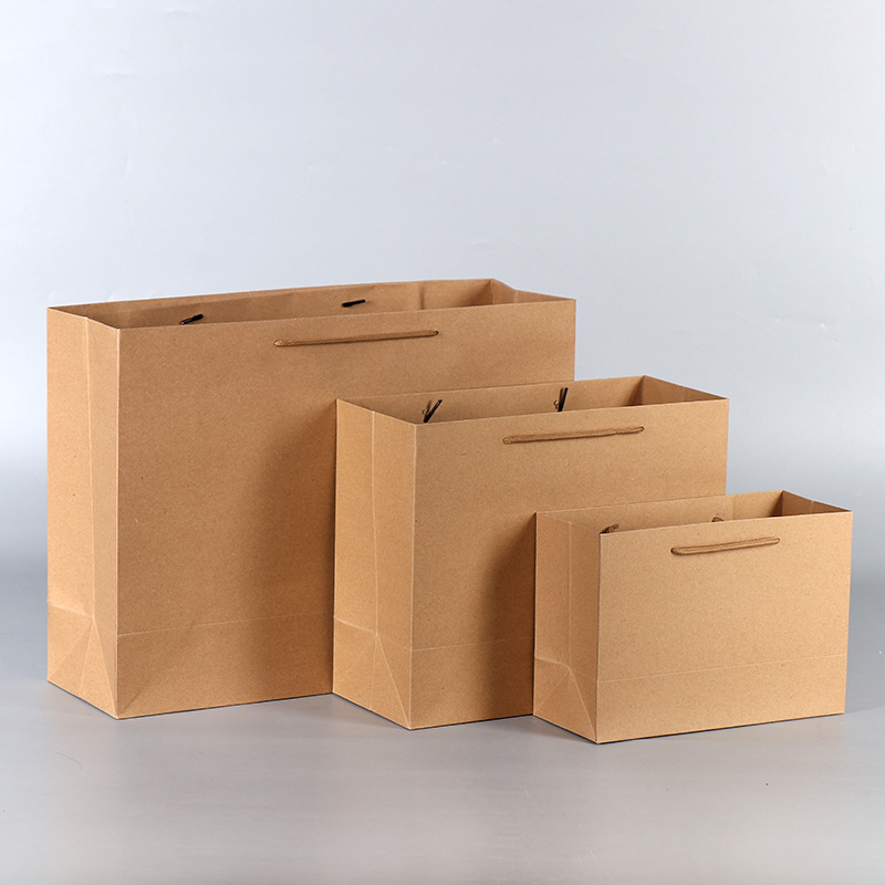 现货批发加厚礼品牛皮纸袋 服装包装袋购物牛皮纸手提袋量大价优