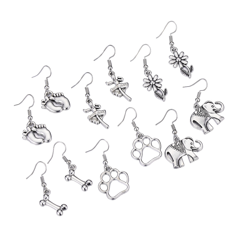 New Retro Alloy Footprint Ballet Bone Flower Earrings Wholesale display picture 5