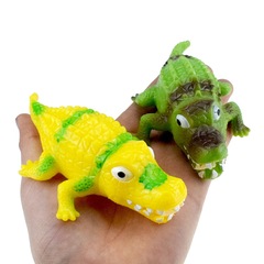 Creative, quirky, spoofy squeeze-and-spit foot-eating crocodile toy—perfect for playful pranks, stress relief, and fun!