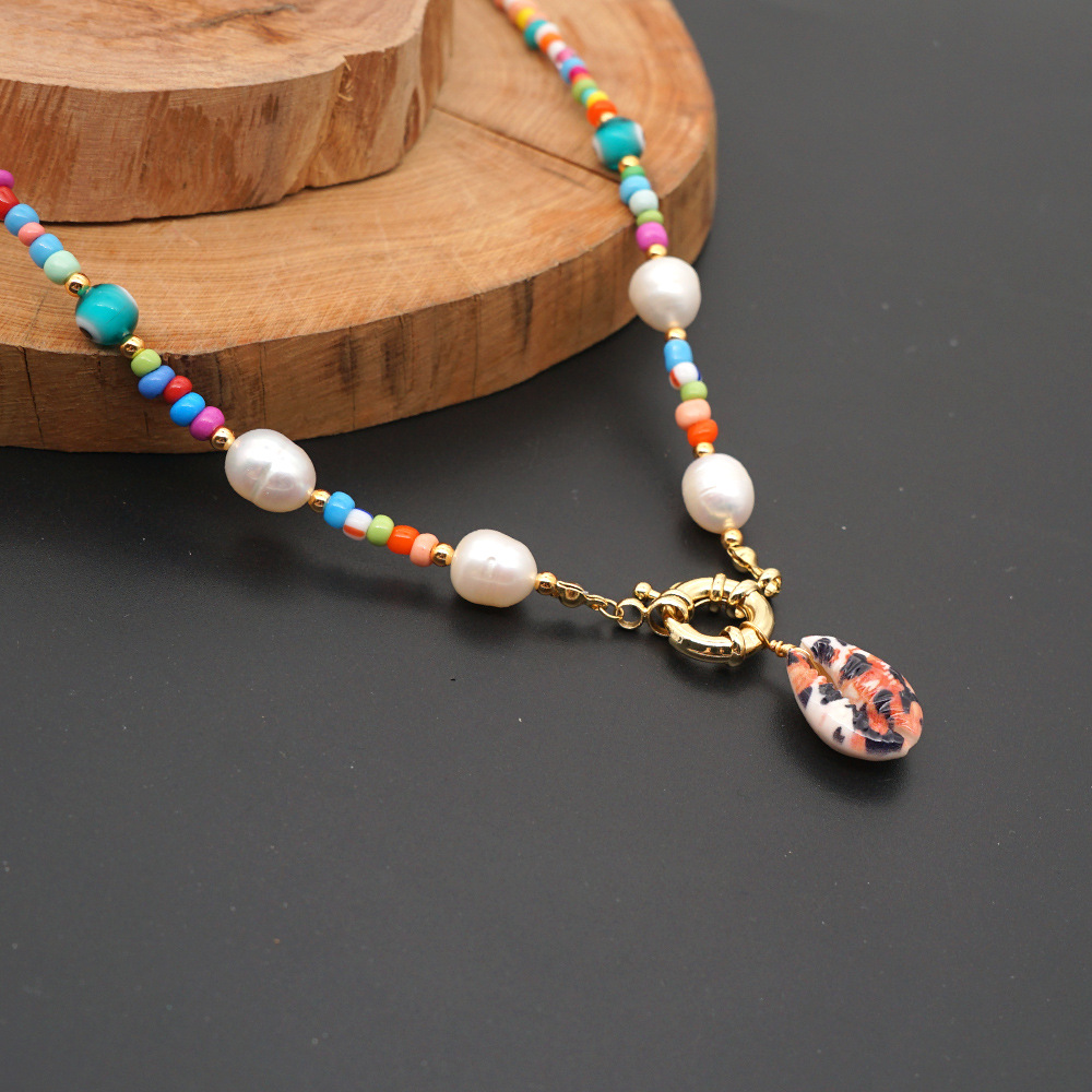 Retro Natural Pearl Bohemian Beach Wind Leopard Shell Color Rice Bead Necklace Wholesale Nihaojewelry display picture 3