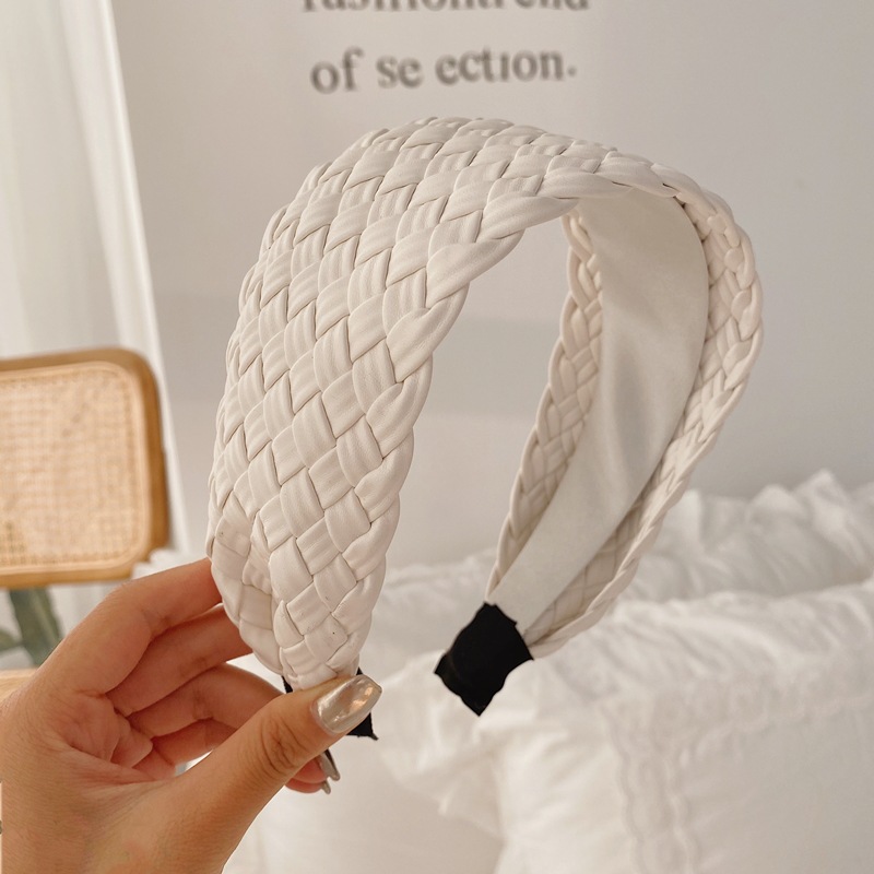 Estilo coreano tejido de ala ancha diadema de moda nuevo elegante imitación de cuero PU diadema Internet celebridad cara lavado cabello paquete malla pelo grutas para las mujeres