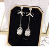 Fashionable earrings, silver needle, cat's eye, silver 925 sample