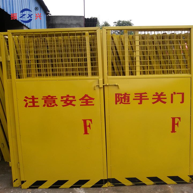 广州直销施工电梯门 楼层防护 建筑工程安全防坠落钢板网电梯门