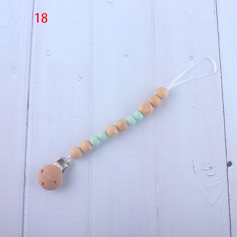 Nueva fábrica directa bebé Beech juguete mordedor bebé chupete de silicona pezón anti-gota cadena materna y infantil suministros