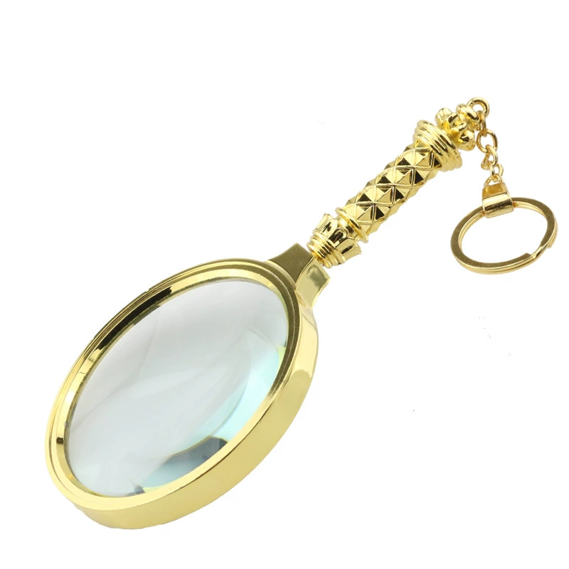 Megonifi 70 мм позолоченная пластиковая ручная оптическая стеклянная лупа для пожилых людей с брелком