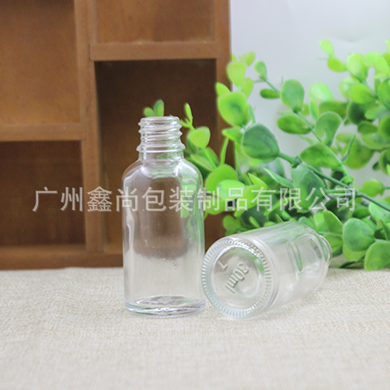 Botella de aceite esencial de vidrio transparente al por mayor botella de mezcla de cabeza de plástico 30ml cuentagotas dilución de envasado botella vacía botella cosmética