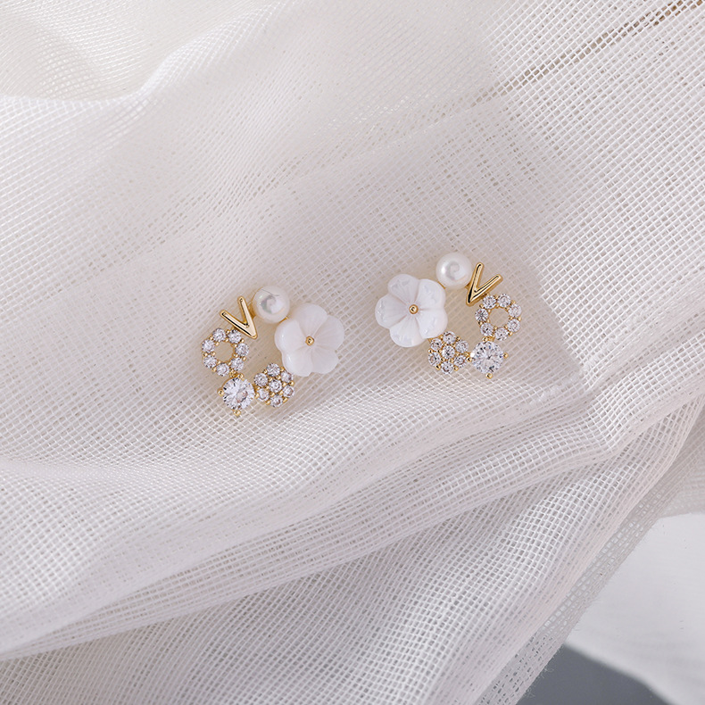 Korean Fashion  Sweet Temperament 925 Silver Needle Shell Flower Earrings Micro-set Zircon Flower  V-shaped Copper Earrings  Wholesale display picture 5