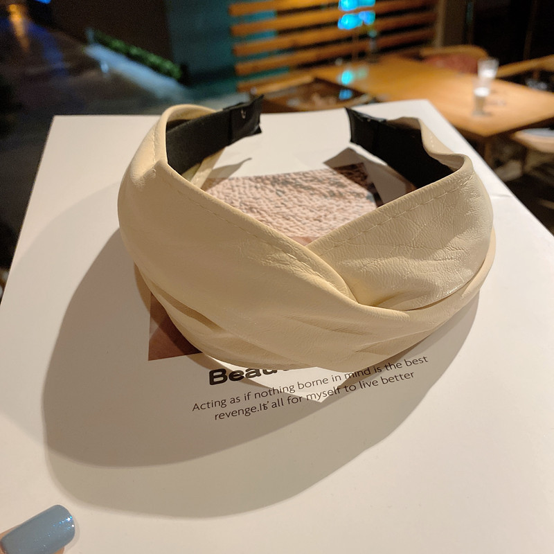 140g Weight Headwear Classification Festival Occasion Pu Leather Material Geometric Pattern Women'S Gender Khaki, Beige, Pink, Green, Blue, Wine Red, Yellow, Black Color Simple Style Wide-brimmed Cross Solid Color Leather Headband Wholesale 8