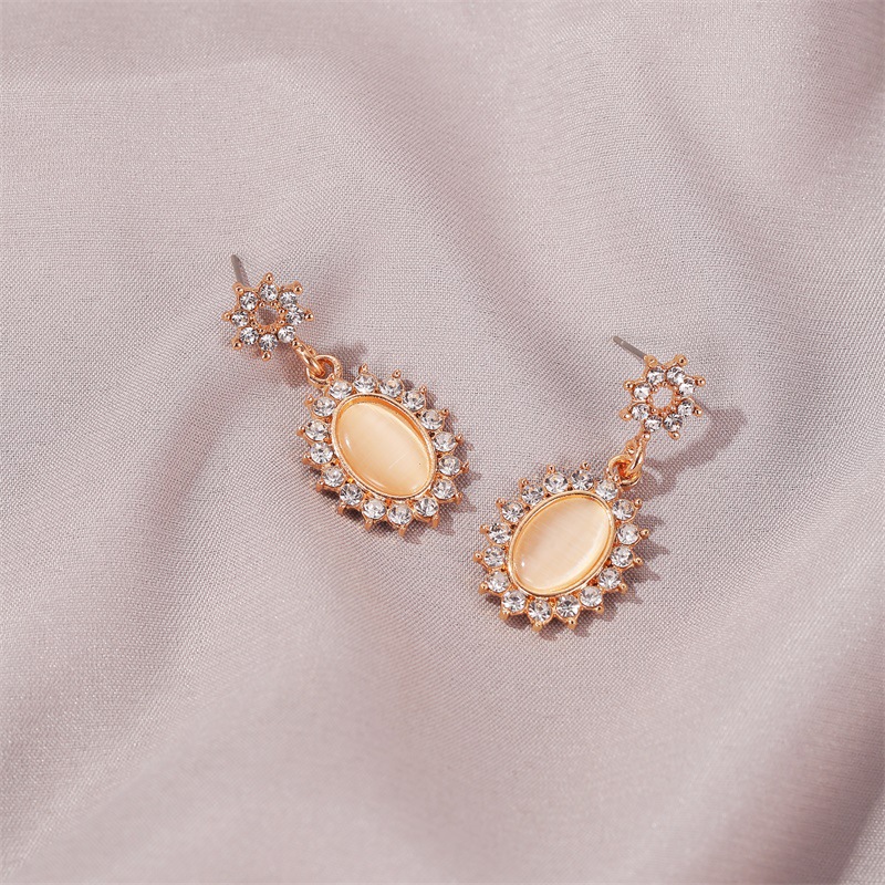 New Micro-inlaid Zircon Oval Necklace Cat's Eye Sun Flower Earrings Wholesale display picture 8