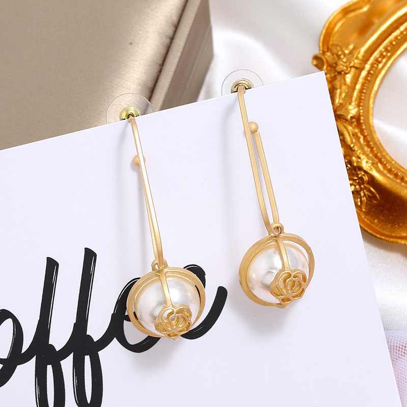 Korea New Creative Simple  Fashion Trend Long Flower Pearl Earrings Wholesale Nihaojewely display picture 6