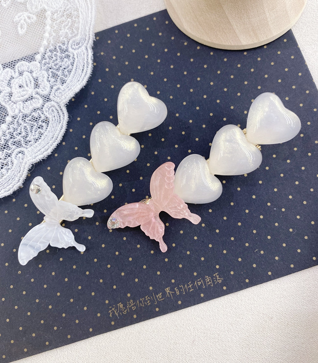 South Korea Butterfly Pearl Rhinestone Side Clip Simple Fashion Love Cute Hairpin Wholesale Nihaojewelry display picture 2