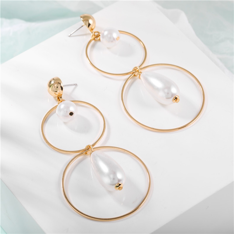 Korean New Fashion Wild Pearl Hollow Circle Geometric Long Earrings Wholesale display picture 8