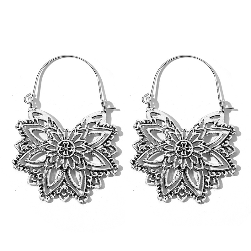 Bohemian Ethnic Carved Rotating Hollow Flowers Retro Earrings Wholesale Nihaojewerly display picture 30