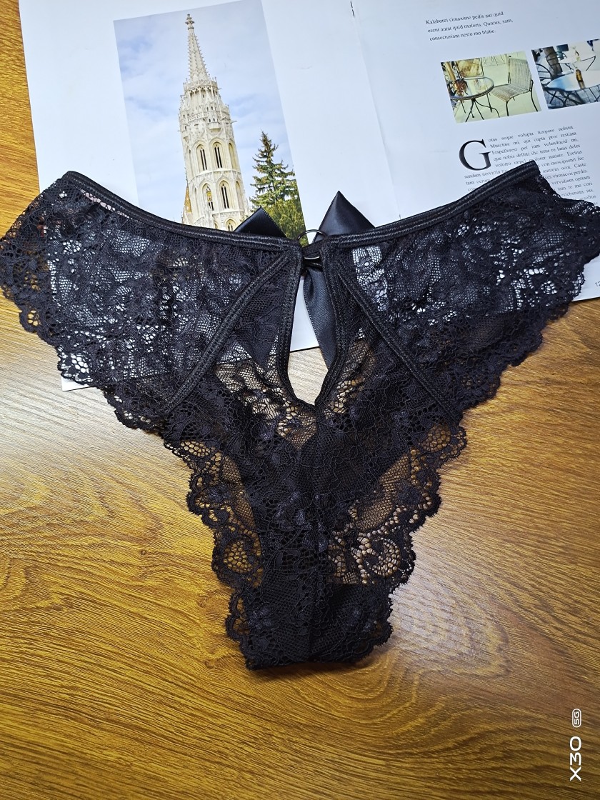 Europa y América sexy ropa interior de cintura alta ropa interior de encaje de malla de las mujeres hollow-out tentación nacimiento año hermosa cadera Tanga T Pantalones