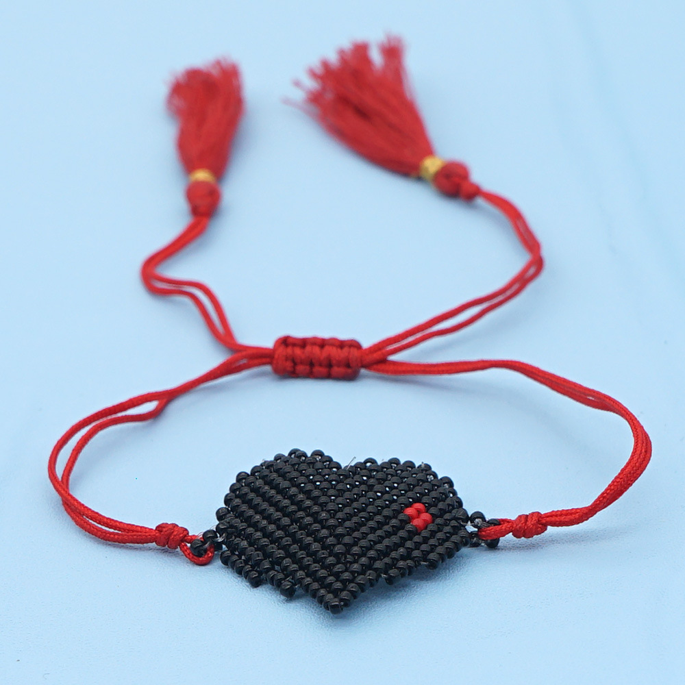 Pulsera De Estilo Étnico Con Borla De Amor Tejida A Mano Con Cuentas De Arroz En Caliente Para Mujer display picture 5