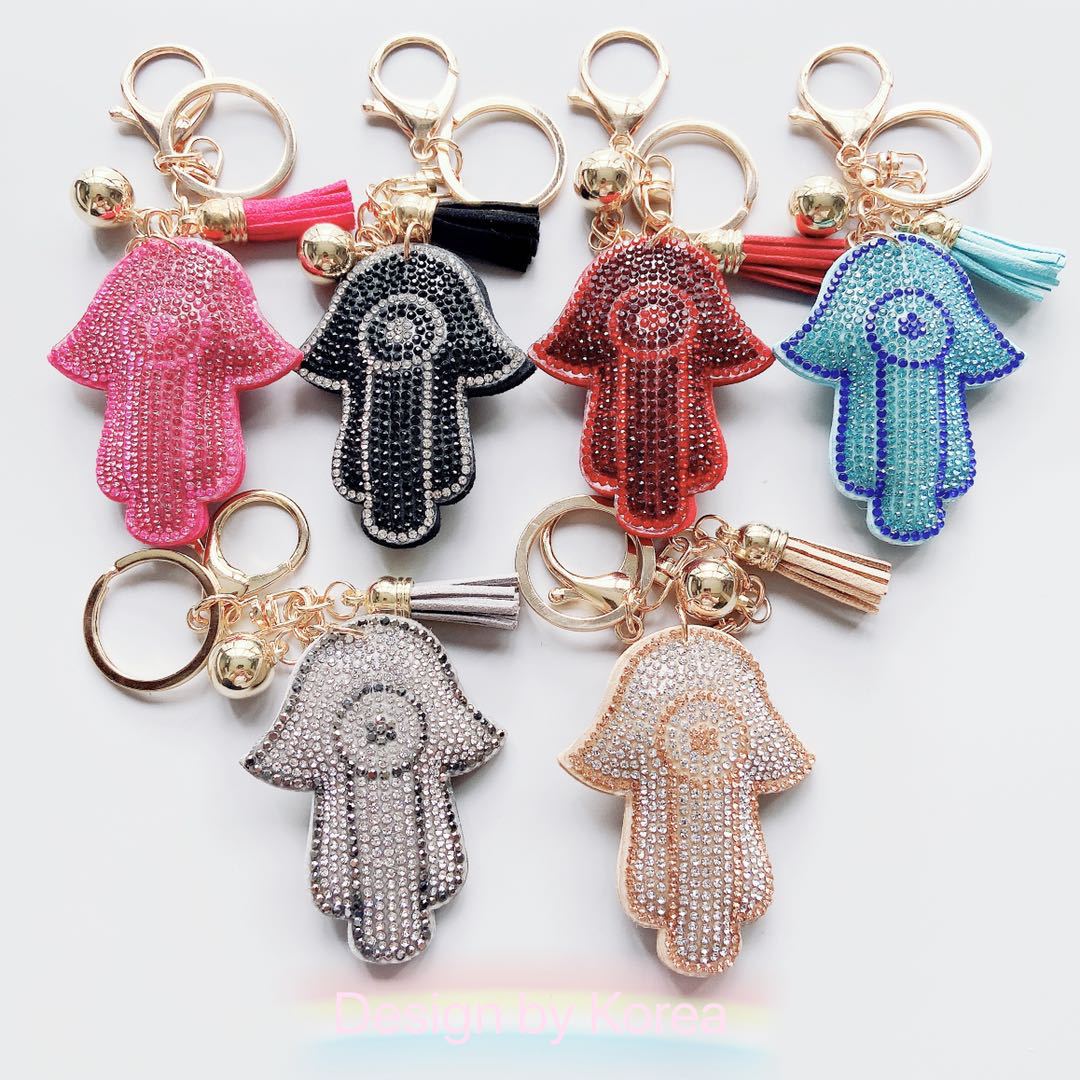 Venta caliente transfronteriza de Palma llavero coreano terciopelo rhinestone gato ojo llavero bolsa colgante accesorios en stock