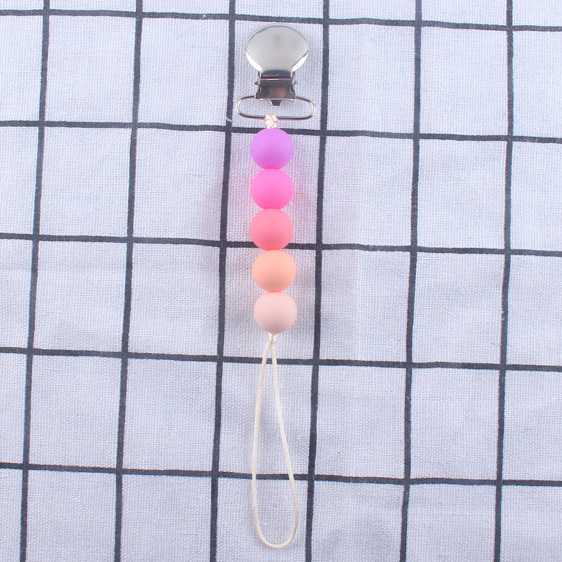 Cadena de pezón de silicona calmante Nuevo clip de hierro clip de pezón Dispositivo de molienda de dientes de bebé cadena anti-caída cadena anti-perdida