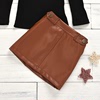 Two piece girl’s dress with high collar and long sleeve top and button open bag leather skirt