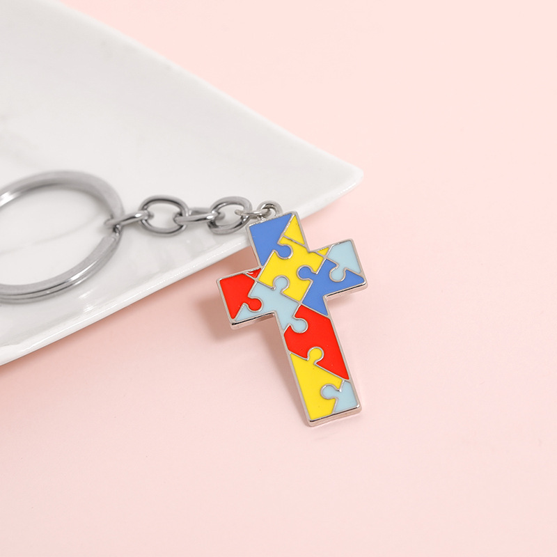 Creative Children's Four-color Puzzle Splicing Color Heart-shaped Cross Keychain Pendant display picture 7