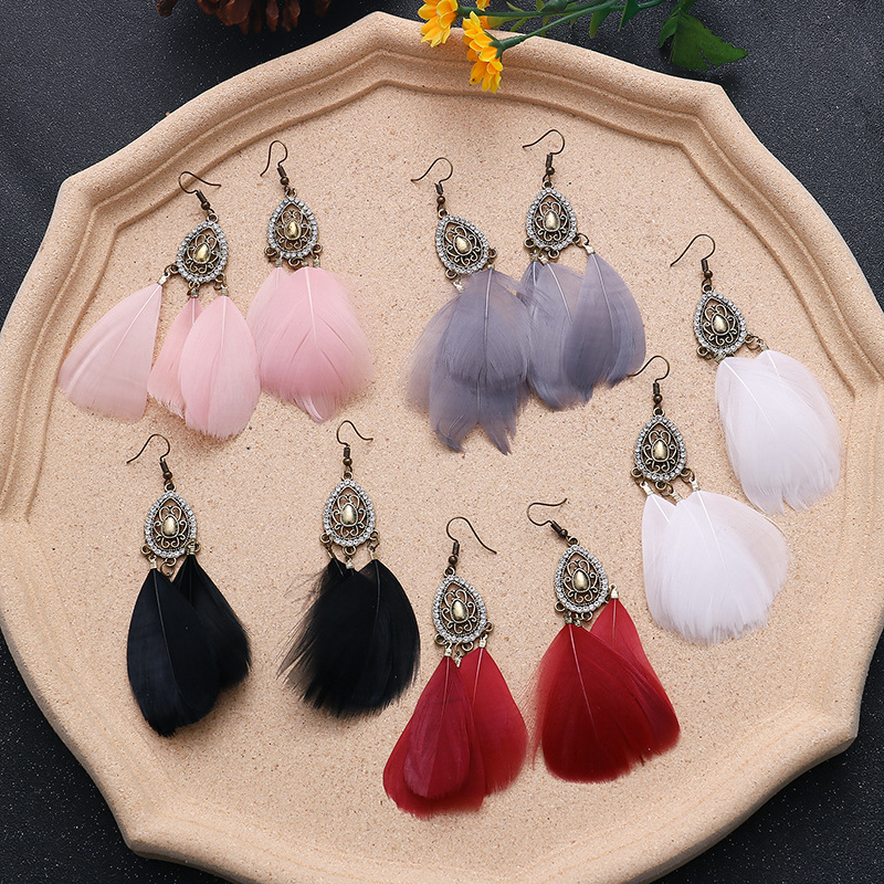 Fashion Hollow Geometric Water Drop Point Drill Feather Drop Earrings Wholesale display picture 1