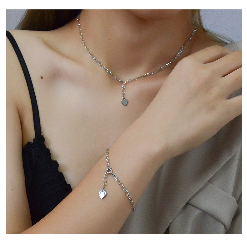 Fashion Tide Round Heart Sleeve Titanium Steel Twist Piece Ring Necklace Bracelet Clavicle Chain Set display picture 11