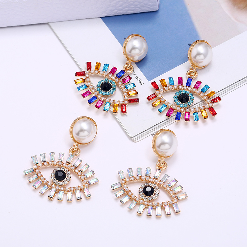 Fashion Exaggerated Devil's Eye Pearl Alloy Inlaid Colored Diamonds Earrings Wholesale display picture 2
