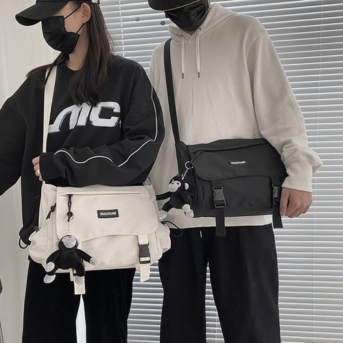 Hong Kong fashion brand couple shoulder backpack new Korean version simple male and female student crossbody bag tooling tutorial bag