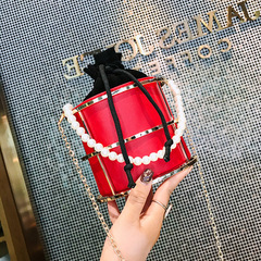 跨境爆品鐵藝鏤空抽繩水桶包新款ins潮珍珠手提鏈條包洋氣斜挎包