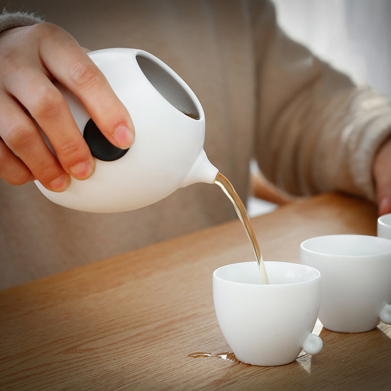 Horno Ding hecho a mano una olla cuatro tazas juego de té caja de regalo viaje azul bolsa portátil simple Kung Fu juego de té traje